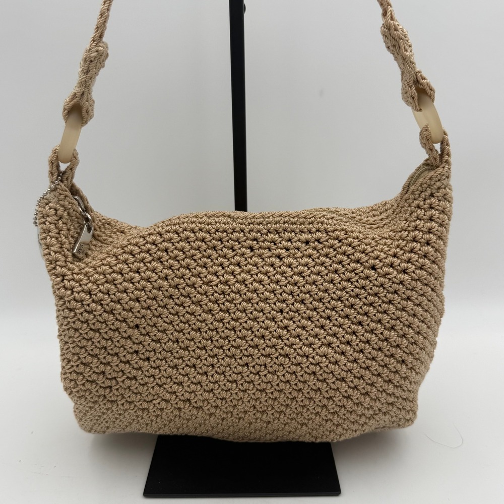 The Sak Tan Crochet Hobo Shoulder Bag Neutral Braided Strap Logo Charm